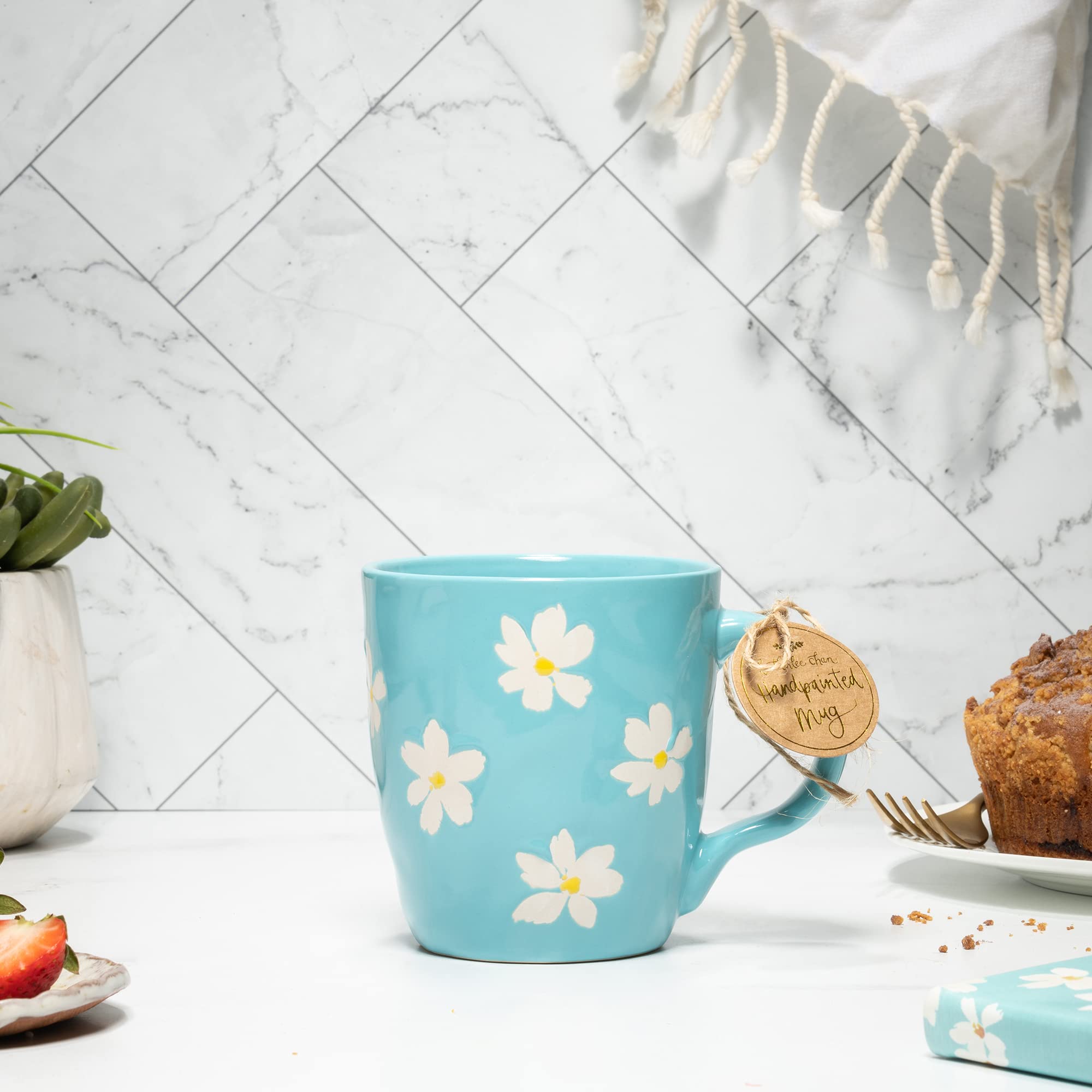 White and Blue Floral Handpainted Stoneware Tea Cup